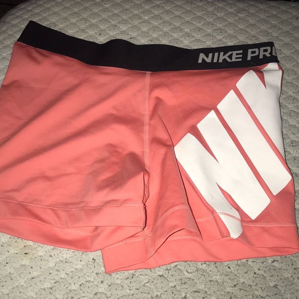 Coral Nike pros.